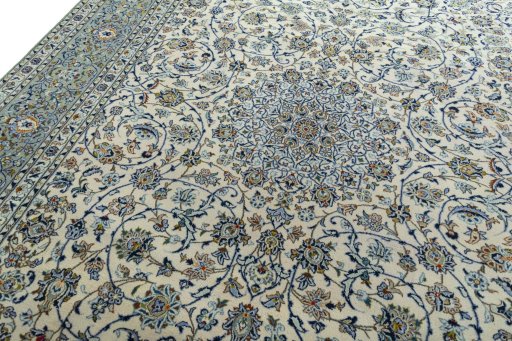 Backside of handmade 2000s Kashan rug showing knot structure and weave density