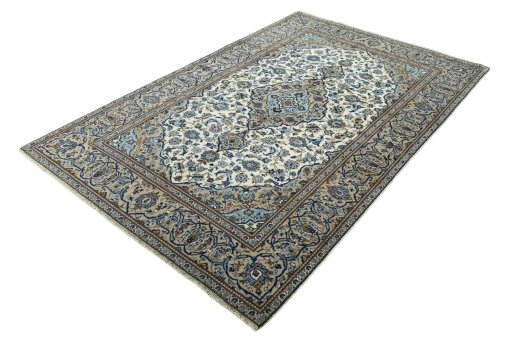 Corner detail of 2000s Kashan rug showing border pattern and Wool pile