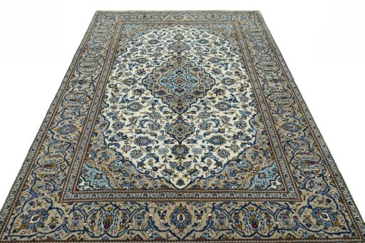 Surface texture of 2000s Kashan rug with natural Wool and intricate pattern