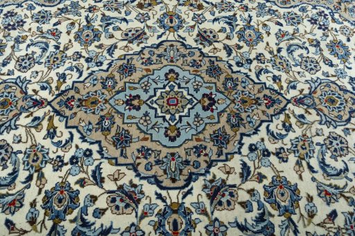 Central medallion detail of 2000s Kashan rug from Iran / Persia