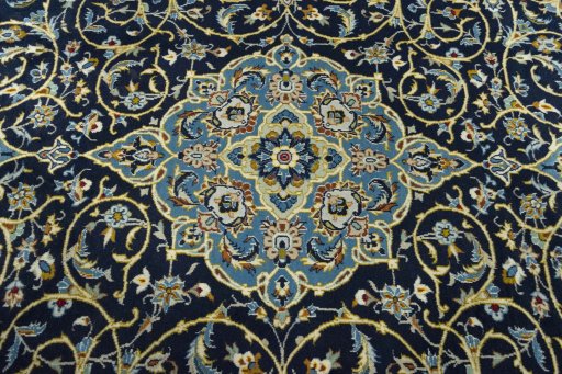 Central medallion detail of 2000s Kashan rug from Iran / Persia