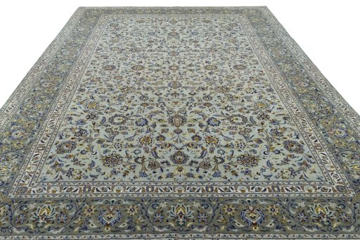 Surface texture of 2000s Kashan rug with natural Wool and intricate pattern