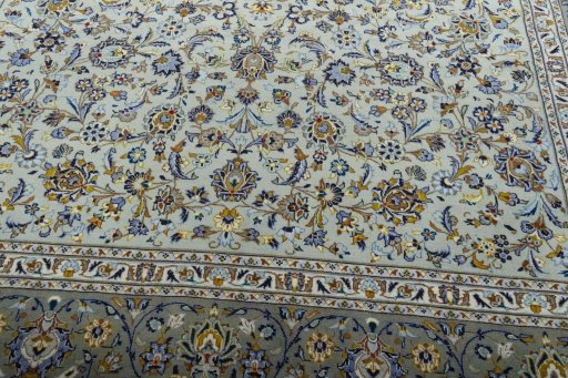 Close-up detail of 2000s Kashan rug from Iran / Persia showing Wool weave