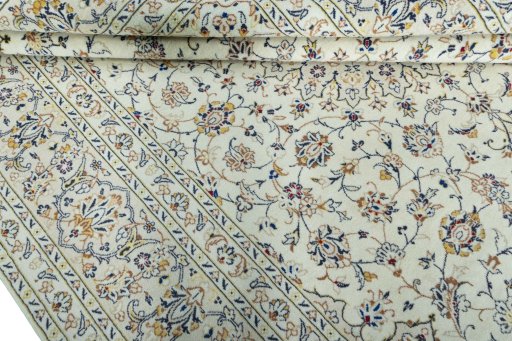 Close-up detail of 2000s Kashan rug from Iran / Persia showing Wool weave
