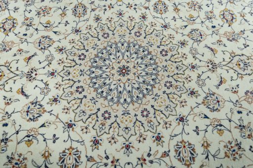 Central medallion detail of 2000s Kashan rug from Iran / Persia