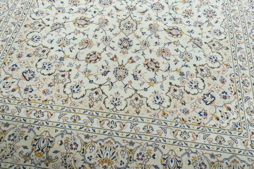 Close-up detail of 2000s Kashan rug from Iran / Persia showing Wool weave