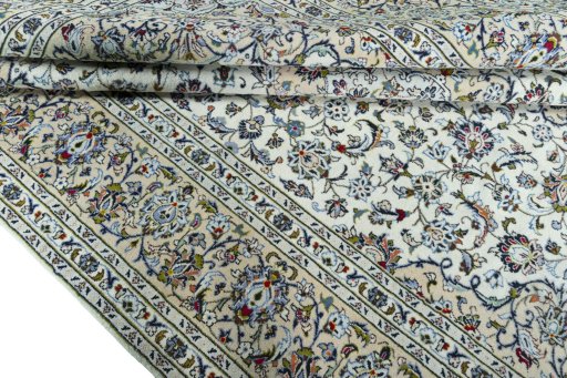 Close-up detail of 2000s Kashan rug from Iran / Persia showing Wool weave