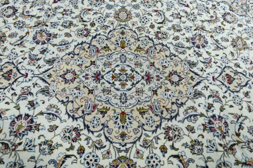 Central medallion detail of 2000s Kashan rug from Iran / Persia