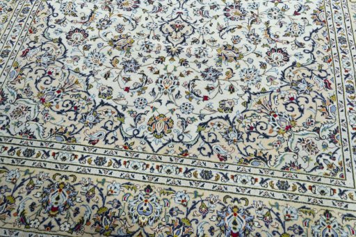 Close-up detail of 2000s Kashan rug from Iran / Persia showing Wool weave