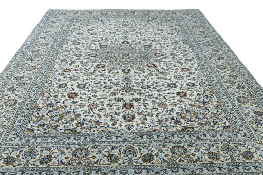 Surface texture of 2000s Kashan rug with natural Wool and intricate pattern