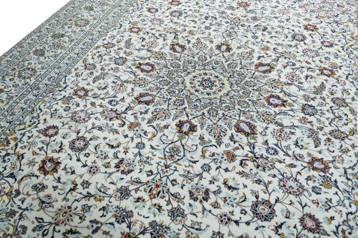 Backside of handmade 2000s Kashan rug showing knot structure and weave density