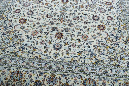 Close-up detail of 2000s Kashan rug from Iran / Persia showing Wool weave