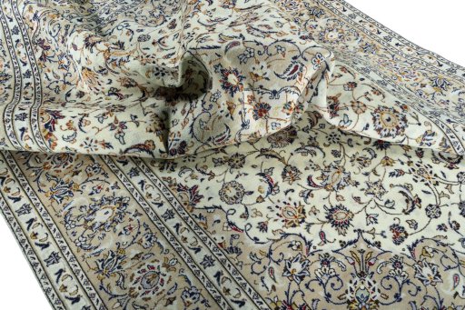 Surface texture of 2000s Kashan rug with natural Wool and intricate pattern