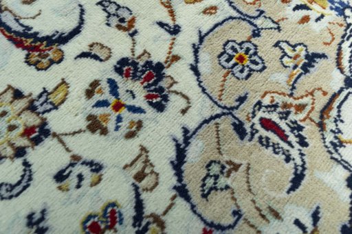 Central medallion detail of 2000s Kashan rug from Iran / Persia