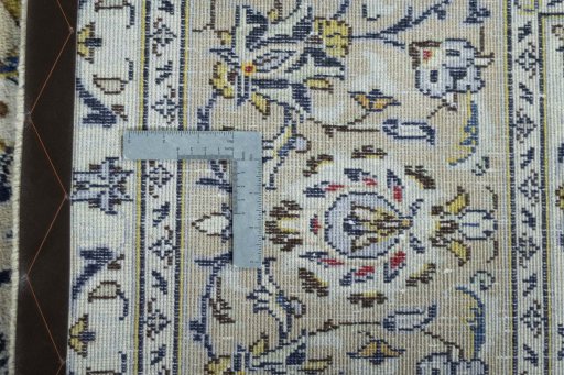 Close-up detail of 2000s Kashan rug from Iran / Persia showing Wool weave