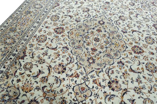 Backside of handmade 2000s Kashan rug showing knot structure and weave density