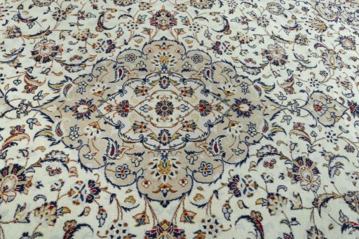 Central medallion detail of 2000s Kashan rug from Iran / Persia
