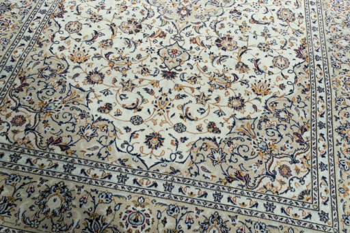 Close-up detail of 2000s Kashan rug from Iran / Persia showing Wool weave
