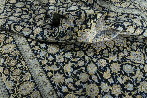 Surface texture of 2000s Kashan rug with natural Wool and intricate pattern