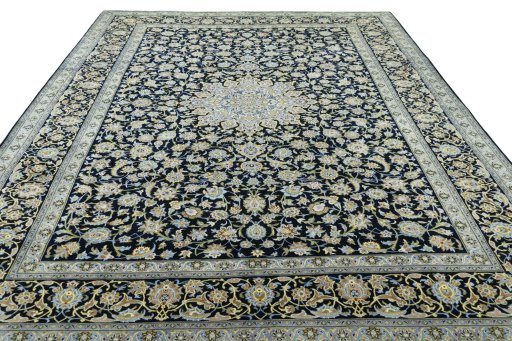Surface texture of 2000s Kashan rug with natural Wool and intricate pattern