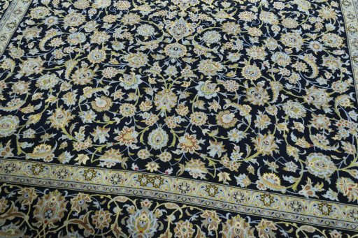 Close-up detail of 2000s Kashan rug from Iran / Persia showing Wool weave