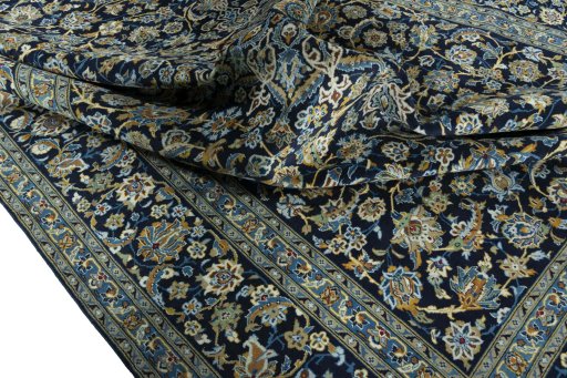 Surface texture of 2000s Kashan rug with natural Wool and intricate pattern
