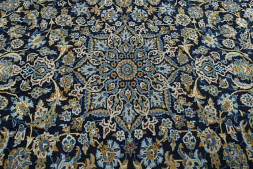 Central medallion detail of 2000s Kashan rug from Iran / Persia