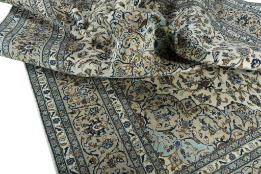 Surface texture of 2000s Kashan rug with natural Wool and intricate pattern