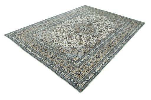 Corner detail of 2000s Kashan rug showing border pattern and Wool pile