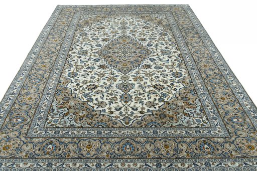 Surface texture of 2000s Kashan rug with natural Wool and intricate pattern