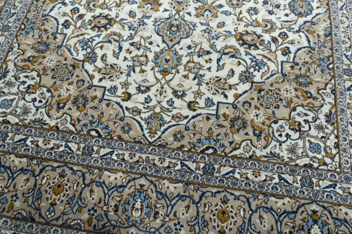 Close-up detail of 2000s Kashan rug from Iran / Persia showing Wool weave