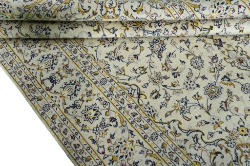 Close-up detail of 2000s Kashan rug from Iran / Persia showing Wool weave