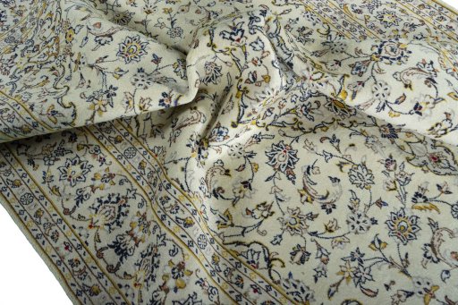 Surface texture of 2000s Kashan rug with natural Wool and intricate pattern