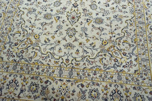 Close-up detail of 2000s Kashan rug from Iran / Persia showing Wool weave