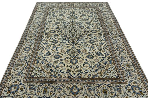 Surface texture of 2000s Kashan rug with natural Wool and intricate pattern