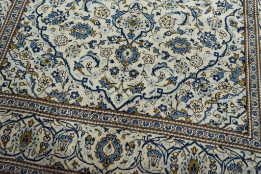 Close-up detail of 2000s Kashan rug from Iran / Persia showing Wool weave