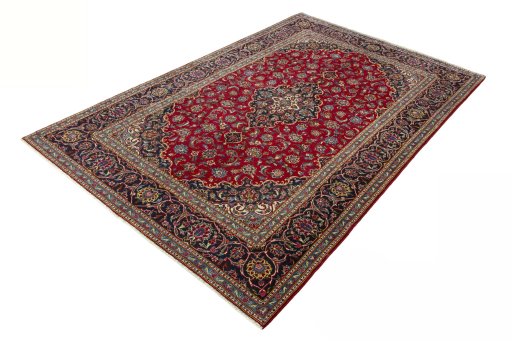 Corner detail of 2000s Kashan rug showing border pattern and Wool pile