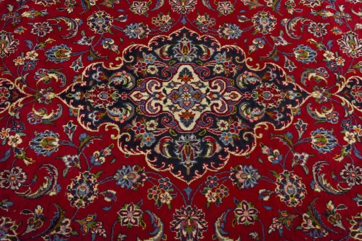 Central medallion detail of 2000s Kashan rug from Iran / Persia