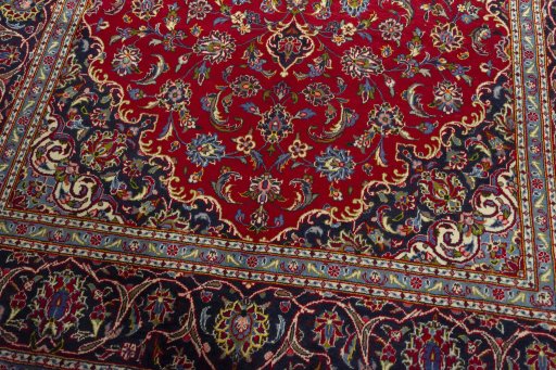 Close-up detail of 2000s Kashan rug from Iran / Persia showing Wool weave