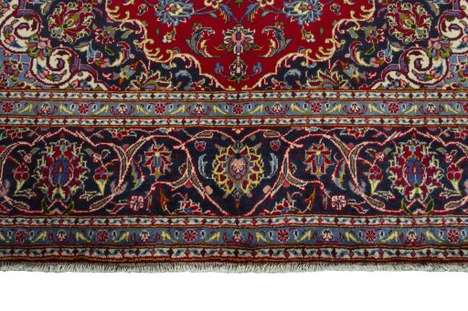 Full view of 2000s Kashan rug from Iran / Persia, 309 × 196 cm in Red tones