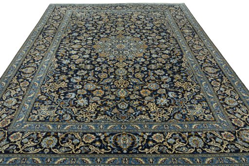 Surface texture of 2000s Kashan rug with natural Wool and intricate pattern