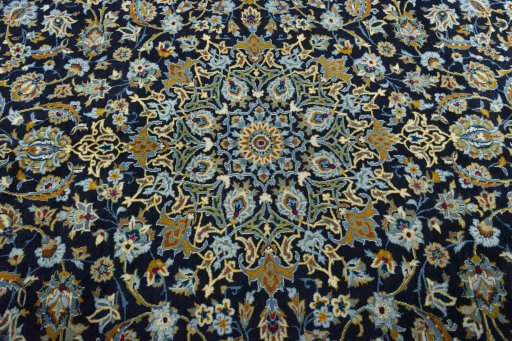 Central medallion detail of 2000s Kashan rug from Iran / Persia