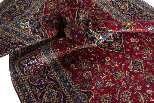 Surface texture of 2000s Kashan rug with natural Wool and intricate pattern