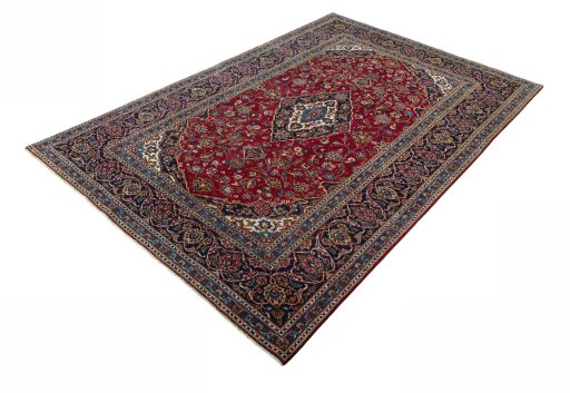 Corner detail of 2000s Kashan rug showing border pattern and Wool pile