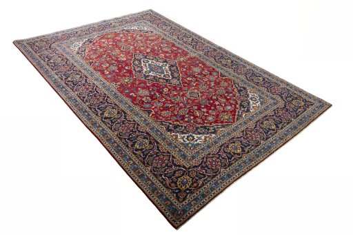 Close-up detail of 2000s Kashan rug from Iran / Persia showing Wool weave