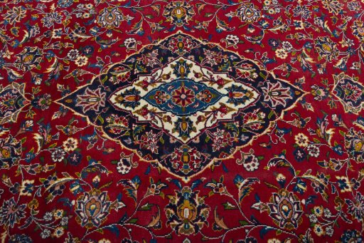 Central medallion detail of 2000s Kashan rug from Iran / Persia