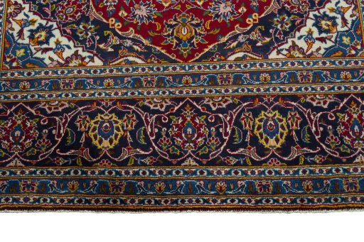 Full view of 2000s Kashan rug from Iran / Persia, 307 × 207 cm in Red tones