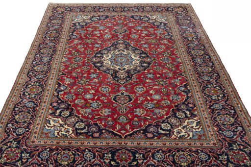 Surface texture of 2000s Kashan rug with natural Wool and intricate pattern