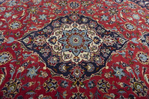 Central medallion detail of 2000s Kashan rug from Iran / Persia