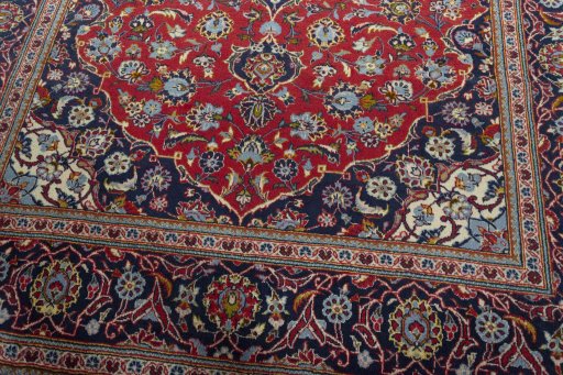 Close-up detail of 2000s Kashan rug from Iran / Persia showing Wool weave